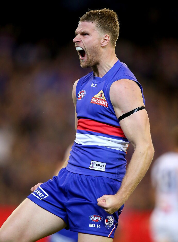 AFL 2015 Second Elimination Final - Western Bulldogs v Adelaide MELBOURNE, AUSTRALIA - SEPTEMBER 12: Jake Stringer of the Bulldogs celebrates a goal during the 2015 AFL Second Elimination Final match between the Western Bulldogs and the Adelaide Crows at the Melbourne Cricket Ground, Melbourne, Australia on September 12, 2015. (Photo by Justine Walker/AFL Media)